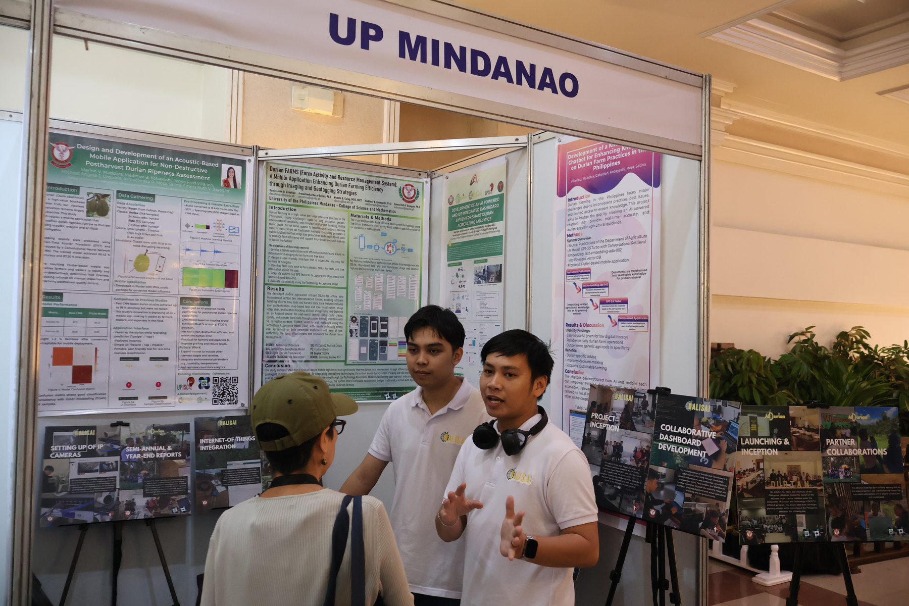 Farmers and researchers collaborating at a community event